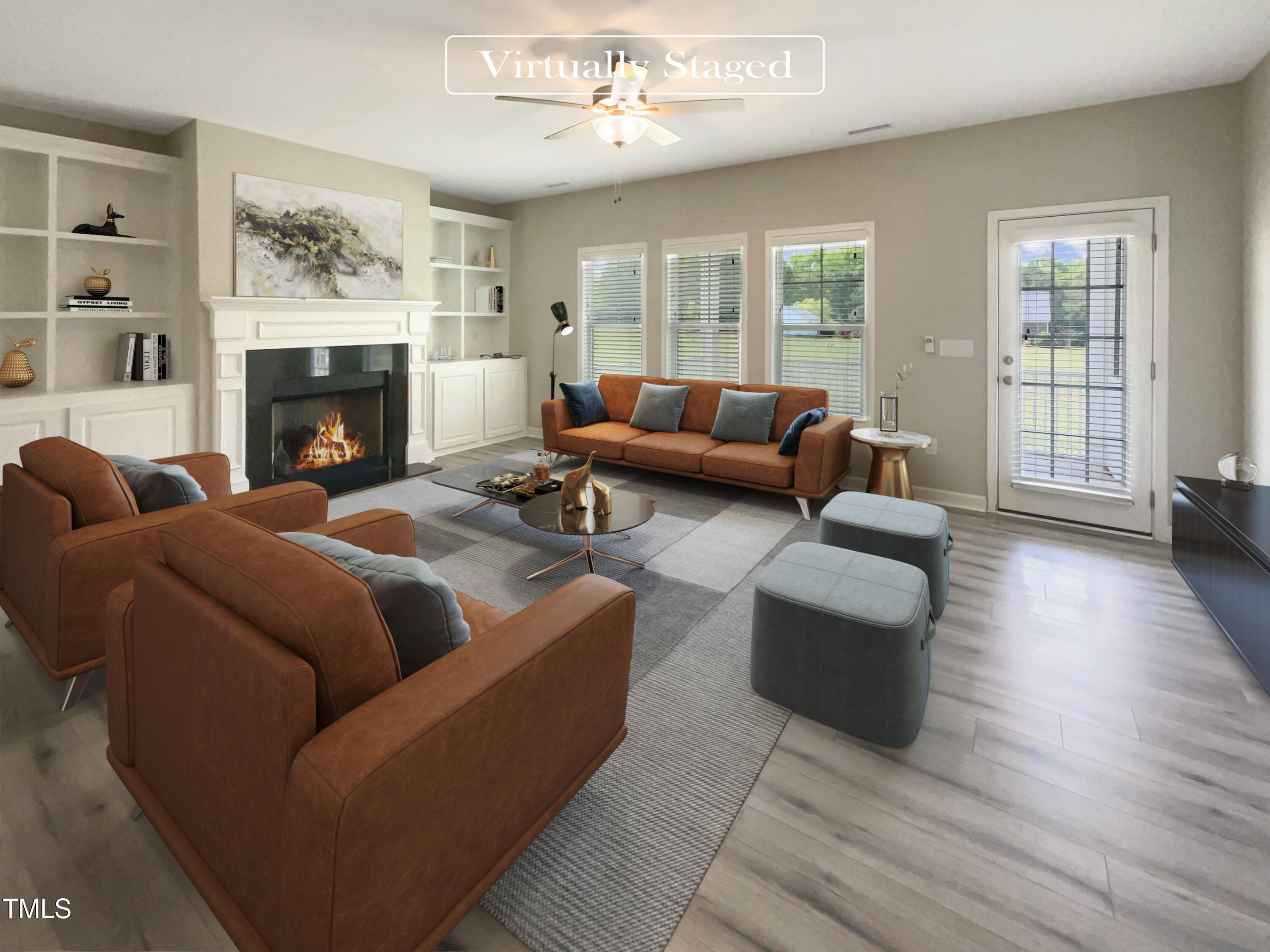 197 Steep Rock Drive Willow Spring, NC 27592 - Photo 2 of 20 a living room with furniture and a fireplace