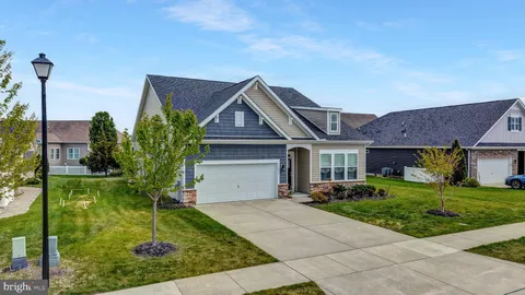 a house view with a garden space