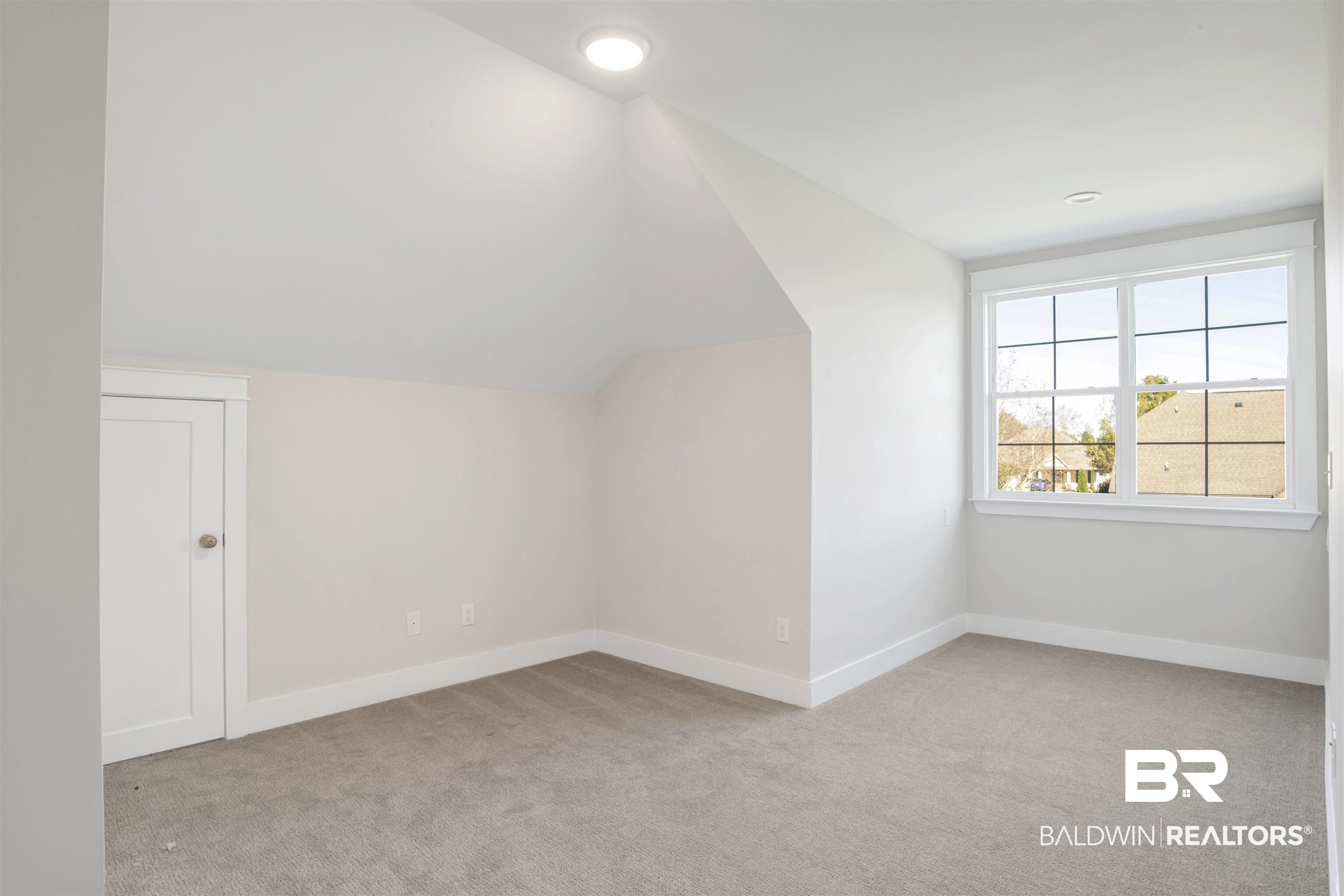 9687 Widgeon Court Daphne, AL 36526 - Photo 30 of 40 Upstairs bedroom featuring light carpet and vaulted ceiling