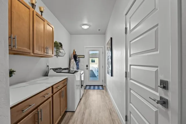 a kitchen with a sink stove and refrigerator