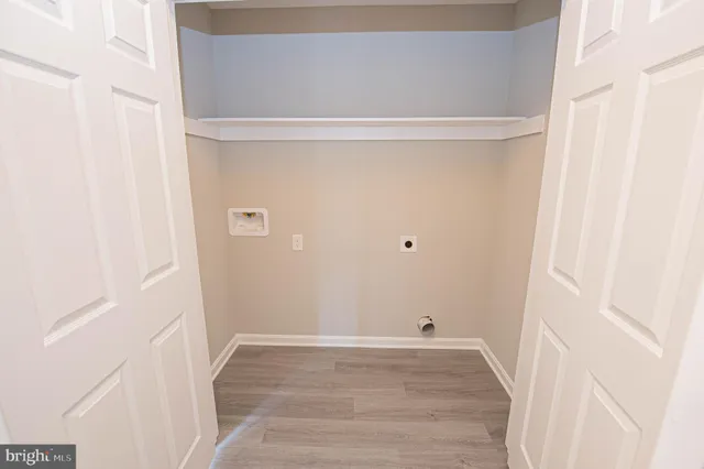 a view of a bathroom with a glass door shower