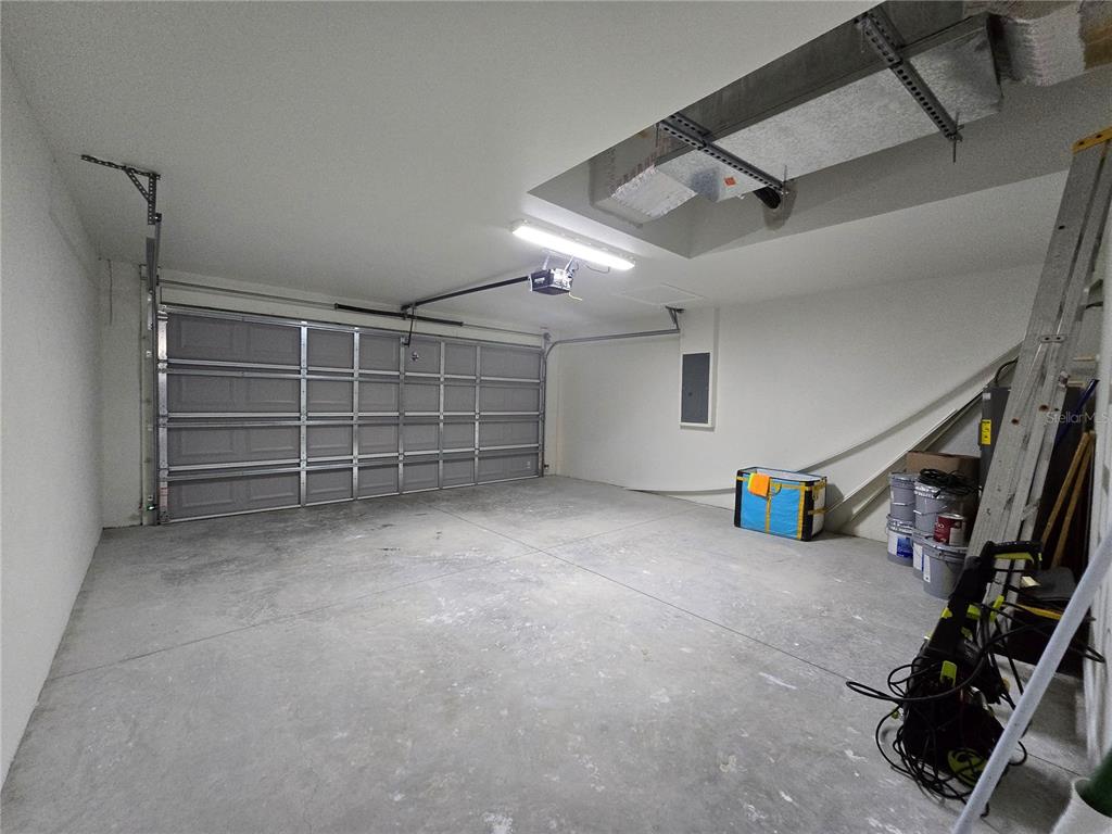 245 Locust Pass Lane Ocala, FL 34472 - Photo 40 of 41 a view of an empty room with gym equipment