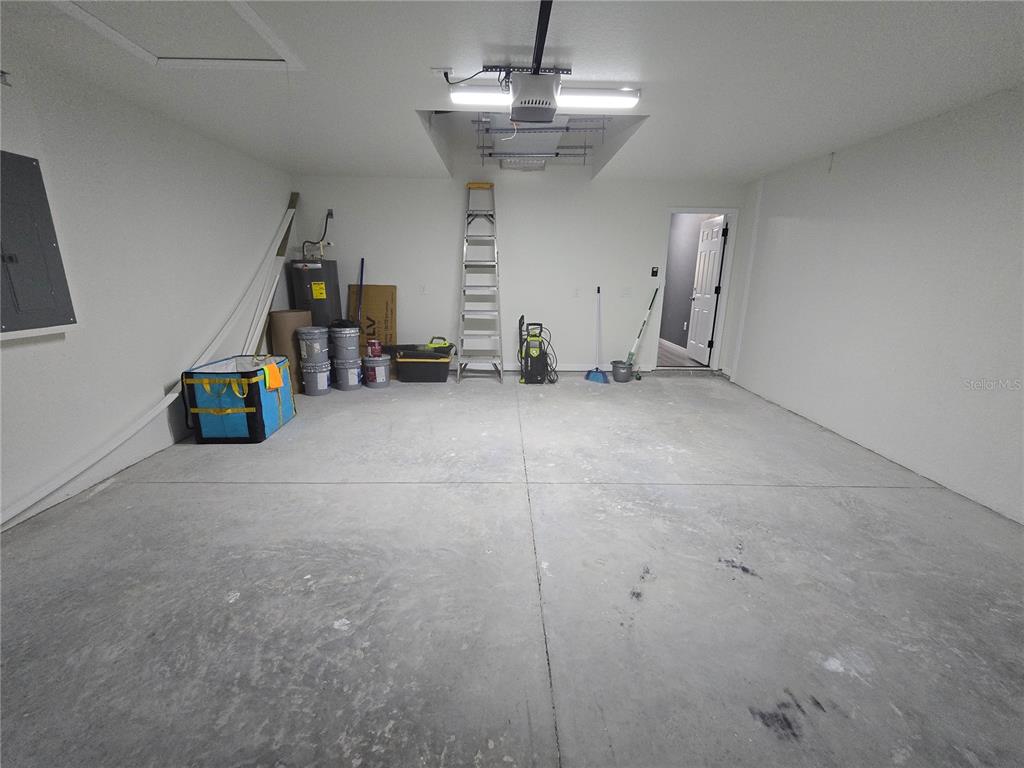 245 Locust Pass Lane Ocala, FL 34472 - Photo 41 of 41 a view of empty room with stairs and decorative lights