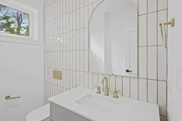 a bathroom with a sink and a toilet