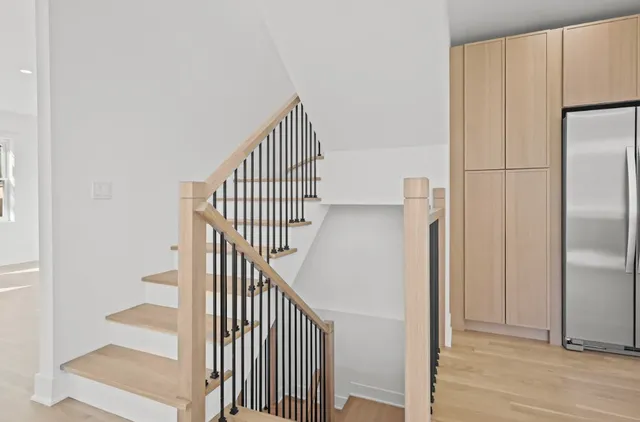 a view of entryway with wooden floor