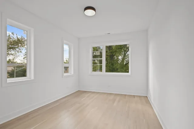 an empty room with windows