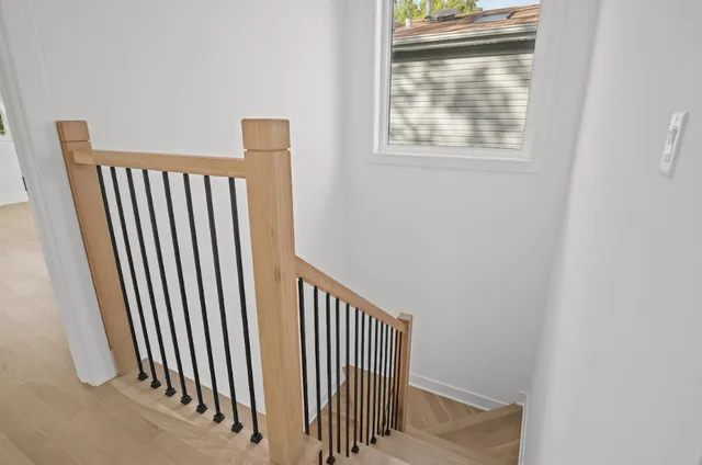 a view of a hallway with a window