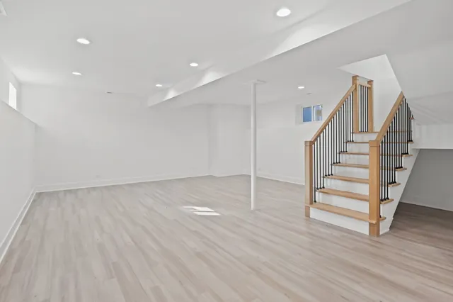 a view of entryway with wooden floor