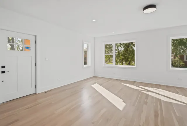 an empty room with windows