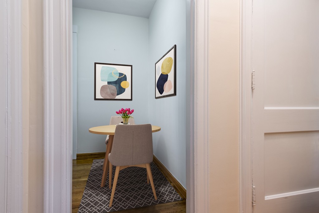 34 Ash Street, Unit 204 Cambridge, MA 02138 - Photo 5 of 10 a dining room with furniture and wooden floor