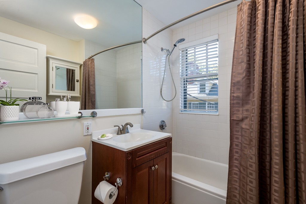 34 Ash Street, Unit 204 Cambridge, MA 02138 - Photo 7 of 10 a bathroom with a sink a toilet and shower