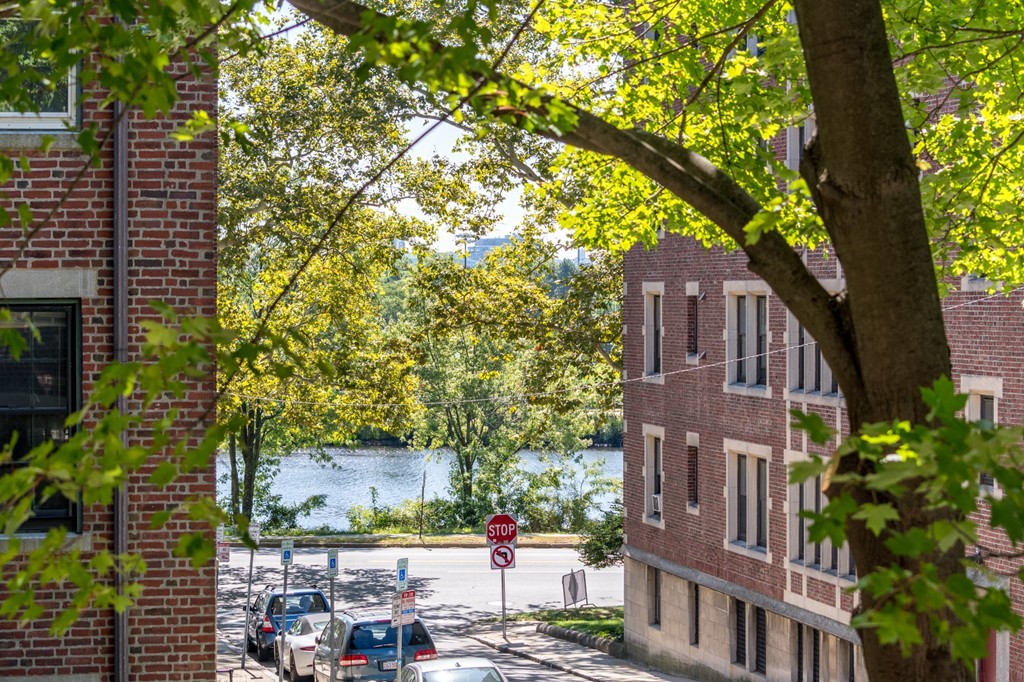 34 Ash Street, Unit 204 Cambridge, MA 02138 - Photo 9 of 10 a view of a city with tall buildings