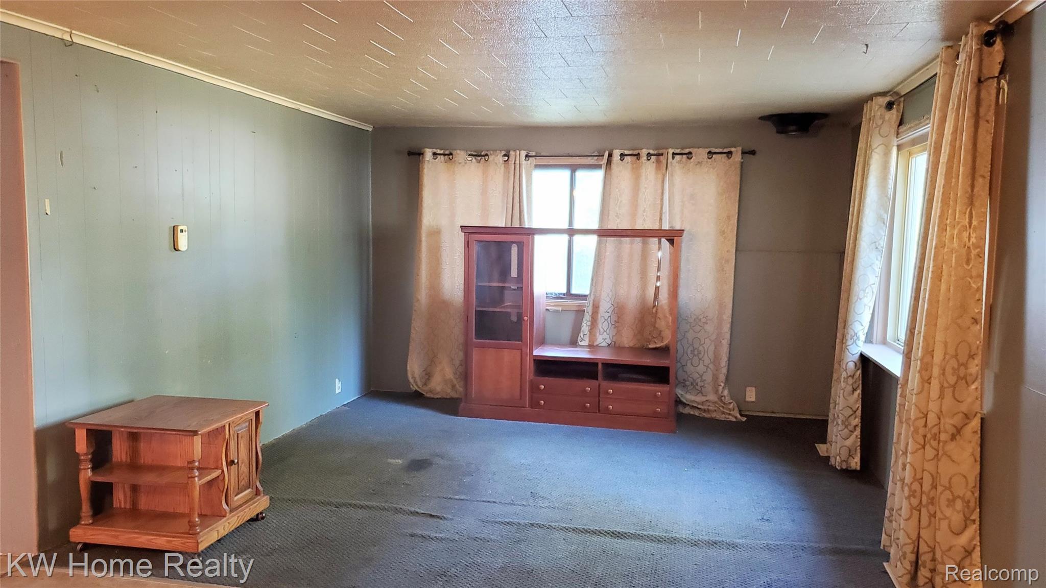 2887 Ivan Street Harrison, MI 48625 - Photo 5 of 16 Living Room with lots of natural light