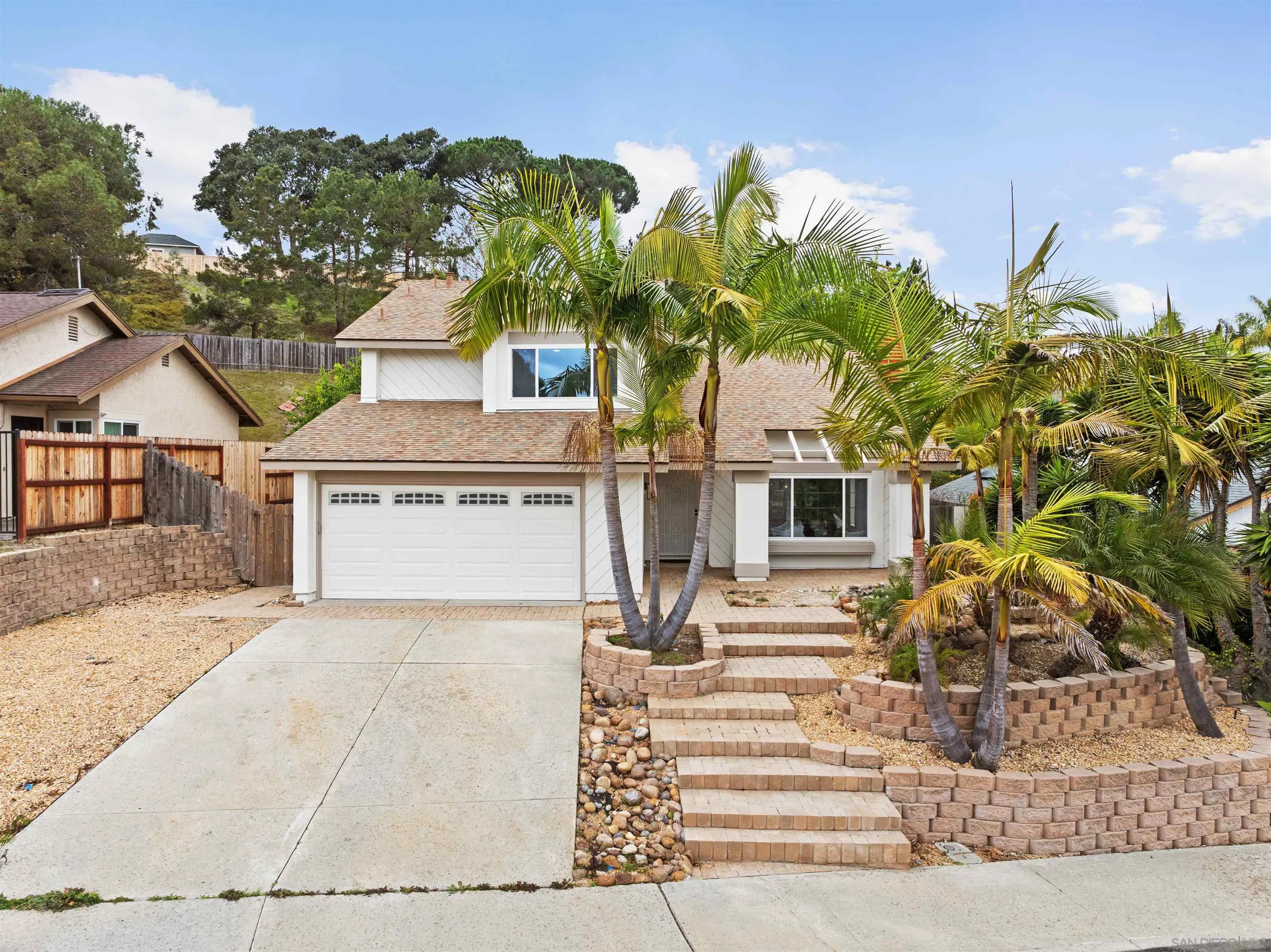 359 Compass Road Oceanside, CA 92054 - Photo 1 of 59 a front view of a house with garden