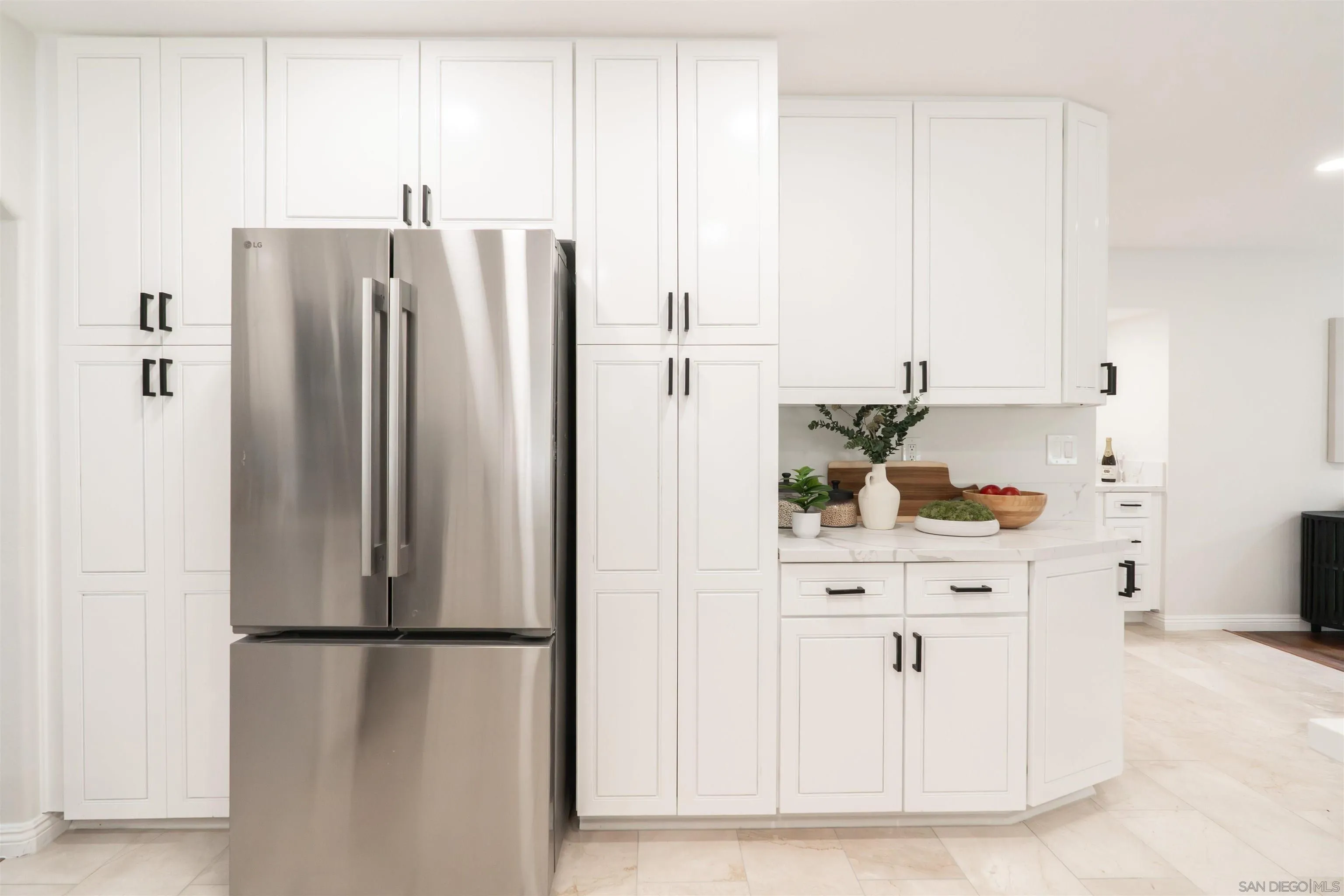 359 Compass Road Oceanside, CA 92054 - Photo 26 of 59 a white refrigerator freezer sitting in a kitchen