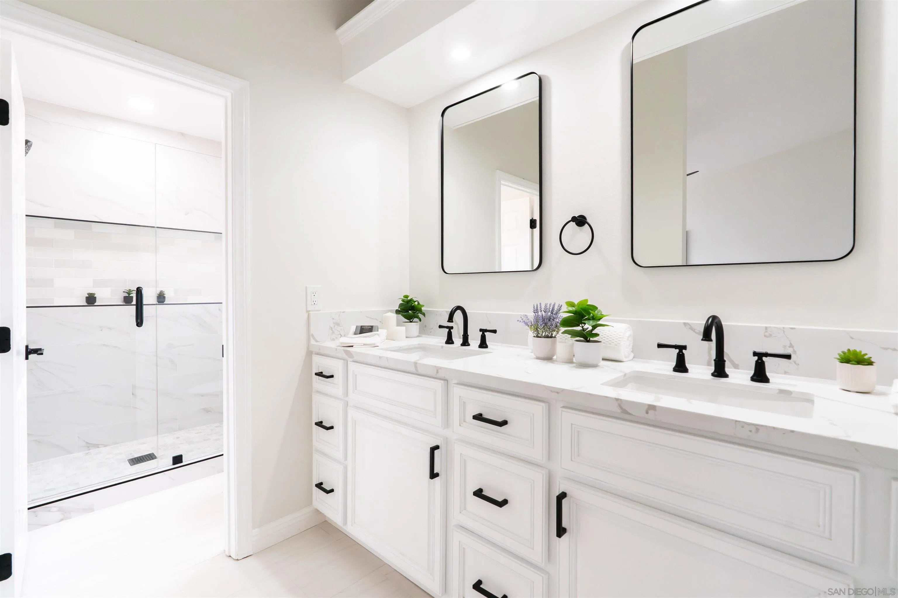 359 Compass Road Oceanside, CA 92054 - Photo 45 of 59 a bathroom with a double vanity sink mirror and