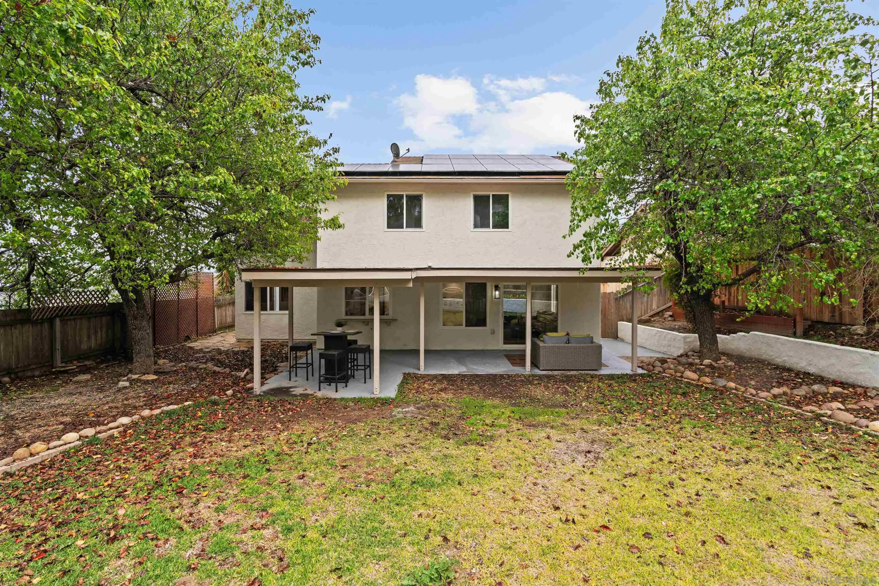 359 Compass Road Oceanside, CA 92054 - Photo 50 of 59 a house view with a sitting space and garden space