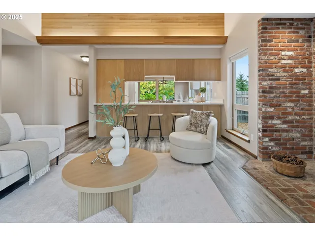 a living room with furniture and a table