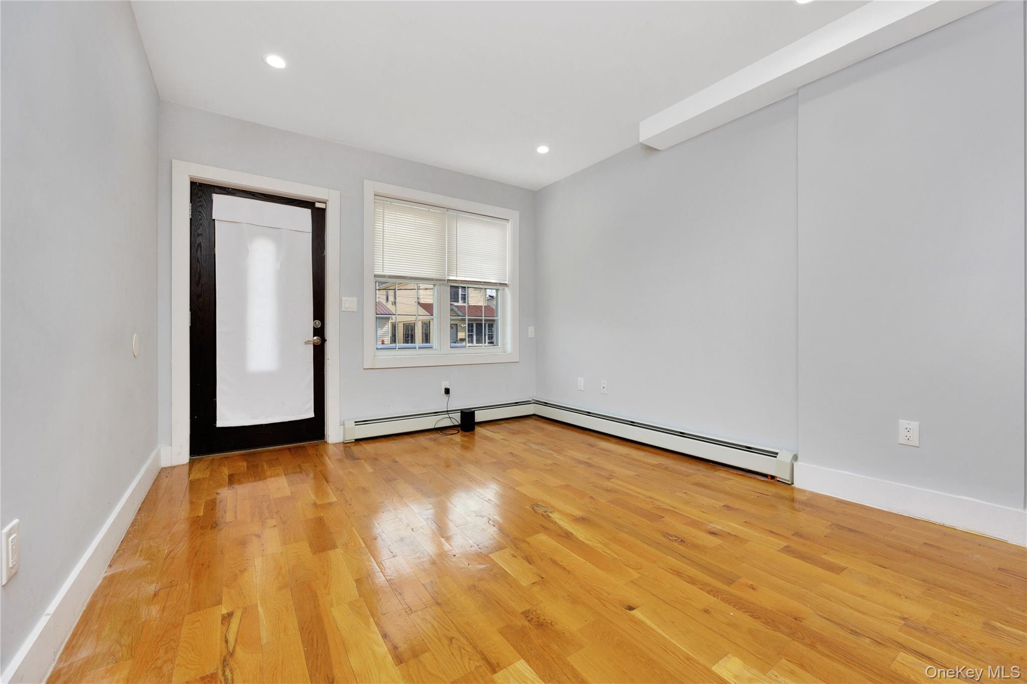 164-15 104th Road Queens, NY 11433 - Photo 3 of 22 1st fl living room