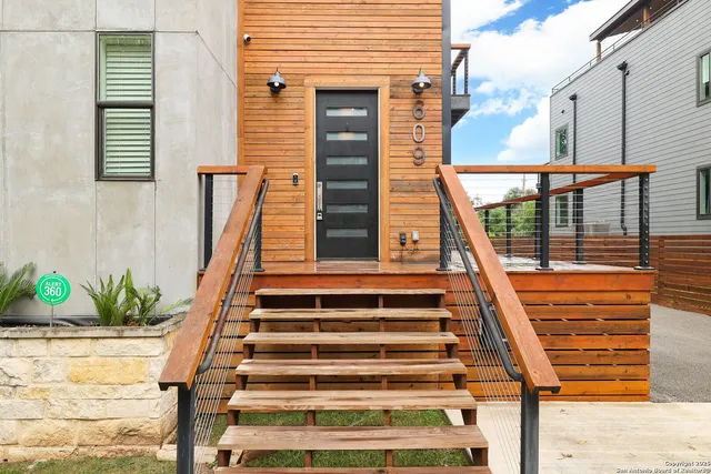 a front view of a house with a large windows