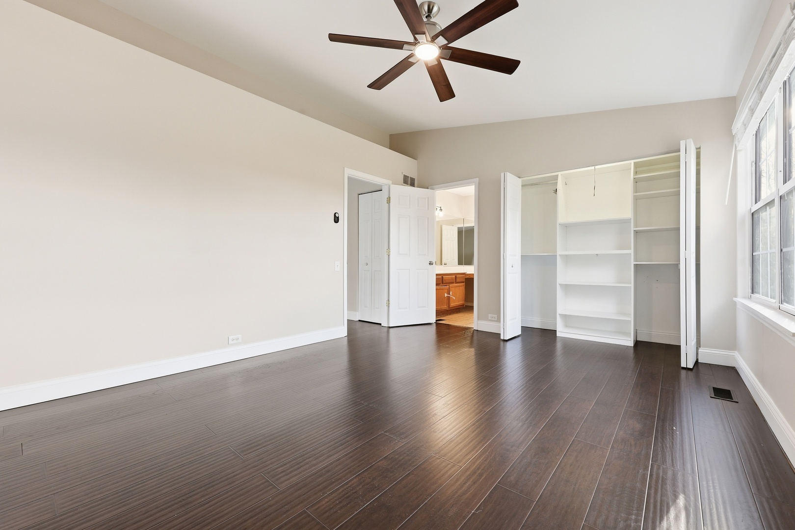 1780 Pebble Beach Circle Elgin, IL 60123 - Photo 12 of 21 a view of empty room with wooden floor and window