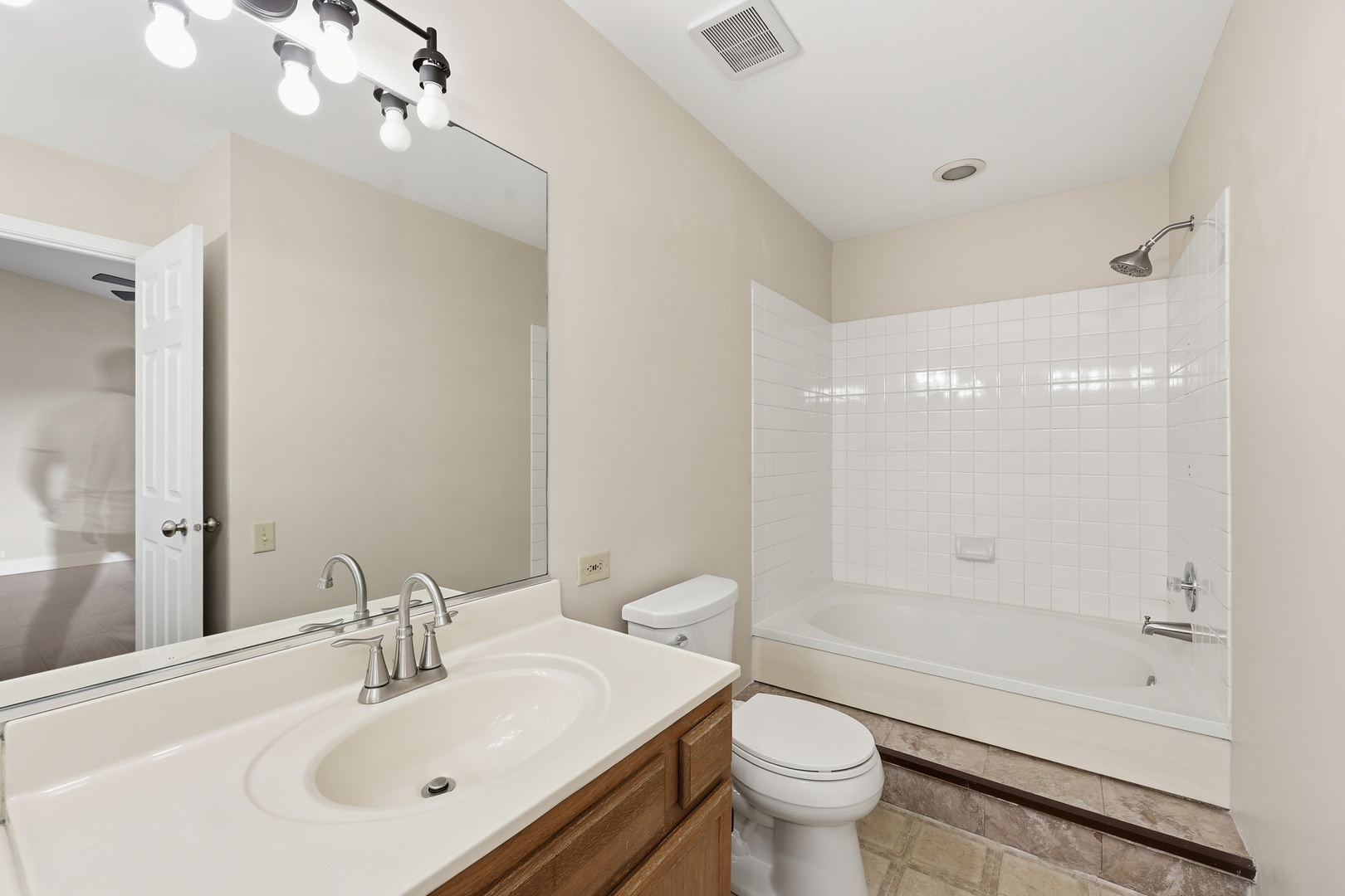 1780 Pebble Beach Circle Elgin, IL 60123 - Photo 18 of 21 a bathroom with a sink a toilet and shower