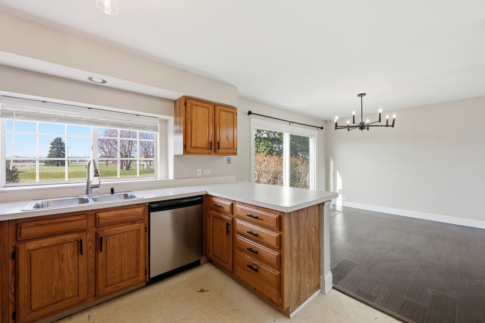 1780 Pebble Beach Circle Elgin, IL 60123 - Photo 7 of 21 a kitchen with a sink and cabinets
