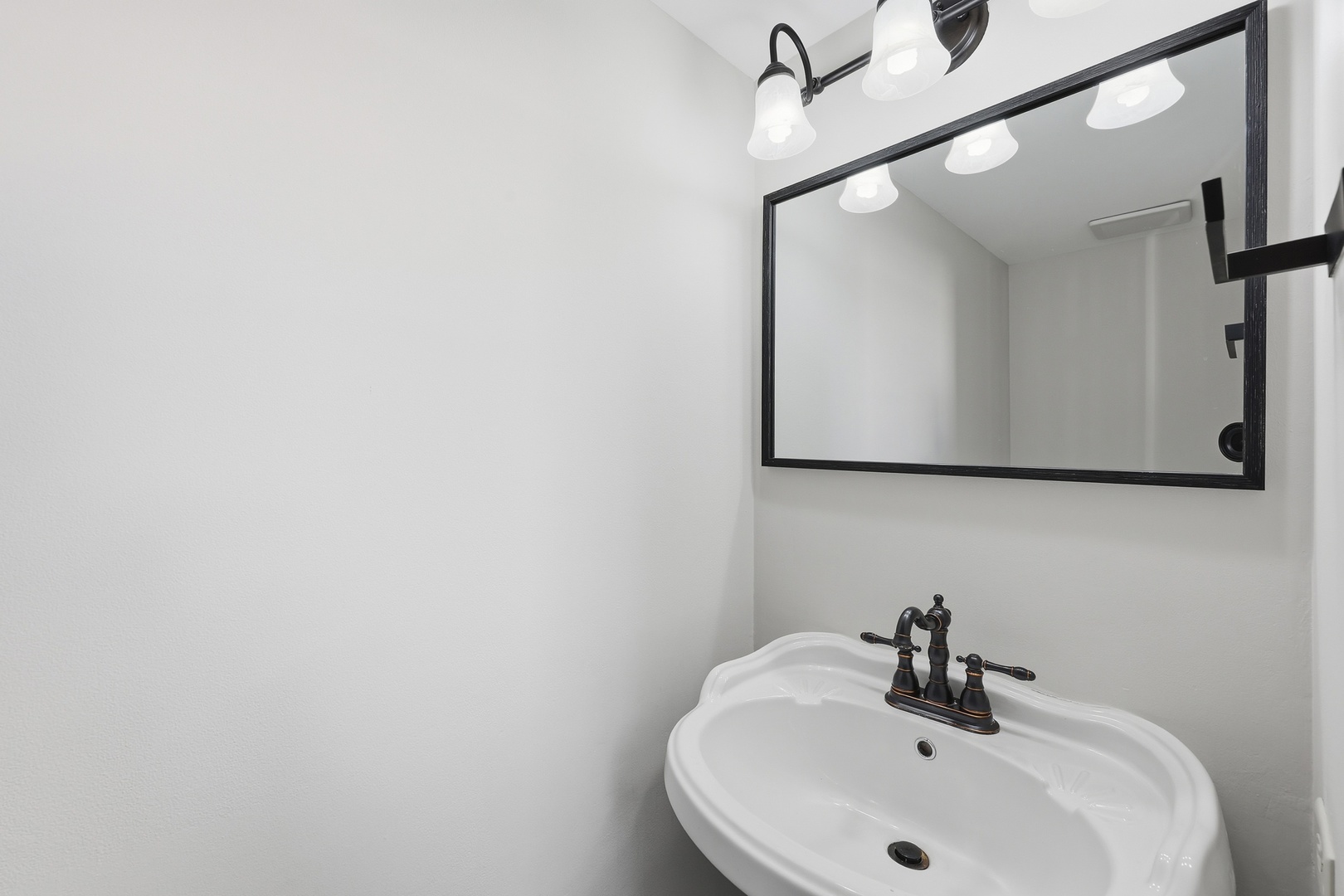 1780 Pebble Beach Circle Elgin, IL 60123 - Photo 8 of 21 a bathroom with a sink and a mirror