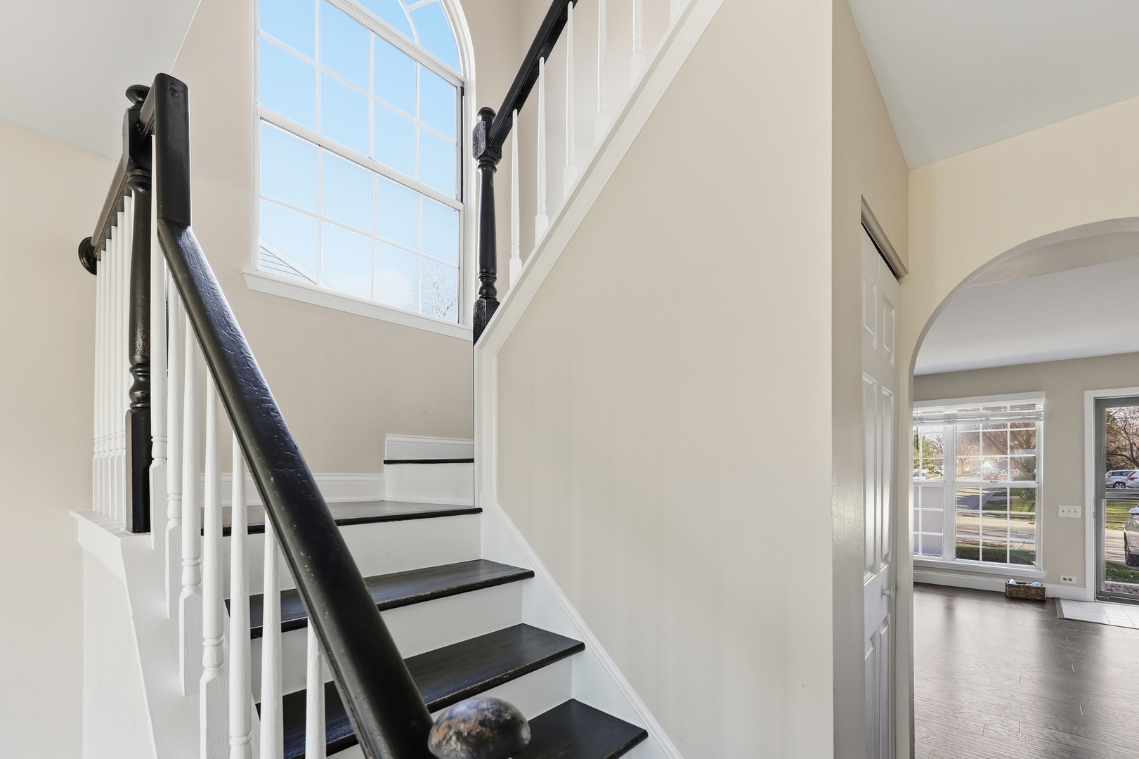 1780 Pebble Beach Circle Elgin, IL 60123 - Photo 9 of 21 a view of staircase with wooden floor and white walls