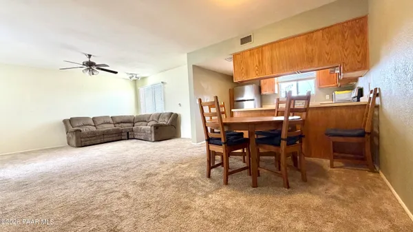 a view of a livingroom with furniture and a rug