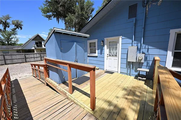 a balcony view with a seating space