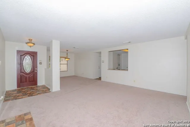 an empty room with window