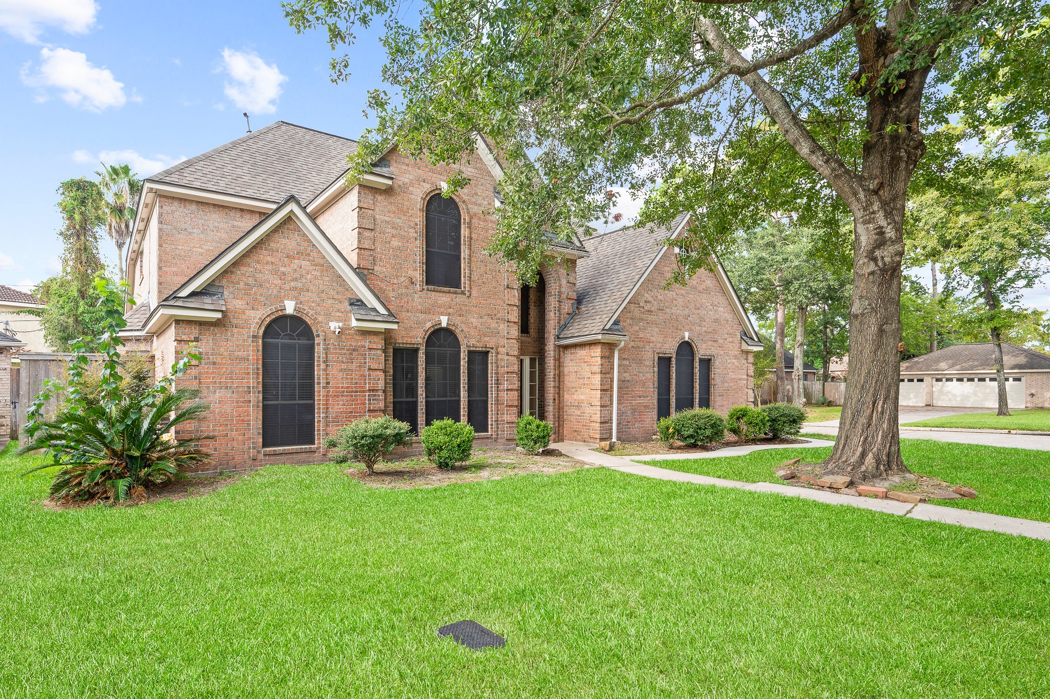 8111 Morningbrook Court Spring, TX 77379 - Photo 1 of 46 a front view of house with yard and green space