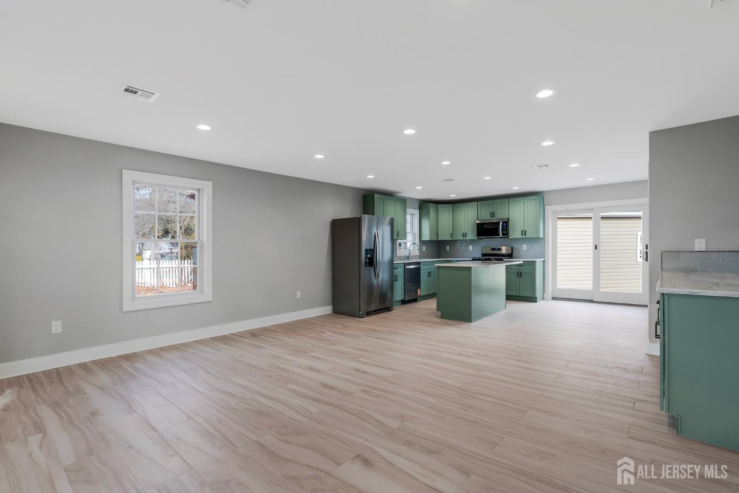 20 Louis Avenue Middlesex, NJ 08846 - Photo 3 of 22 a view of kitchen with refrigerator and wooden floor