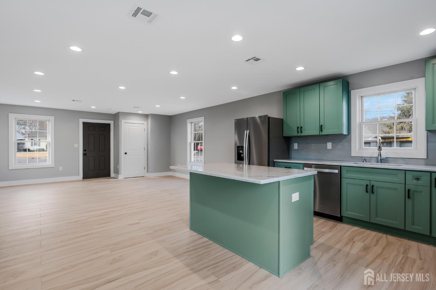 20 Louis Avenue Middlesex, NJ 08846 - Photo 6 of 22 a kitchen with sink and cabinets