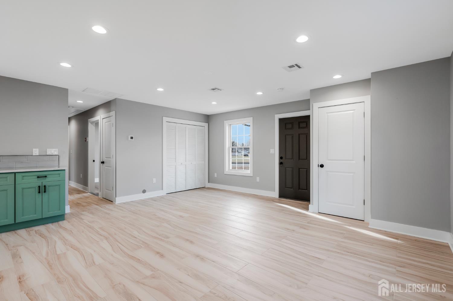 20 Louis Avenue Middlesex, NJ 08846 - Photo 10 of 22 a view of an empty room with wooden floor and closet
