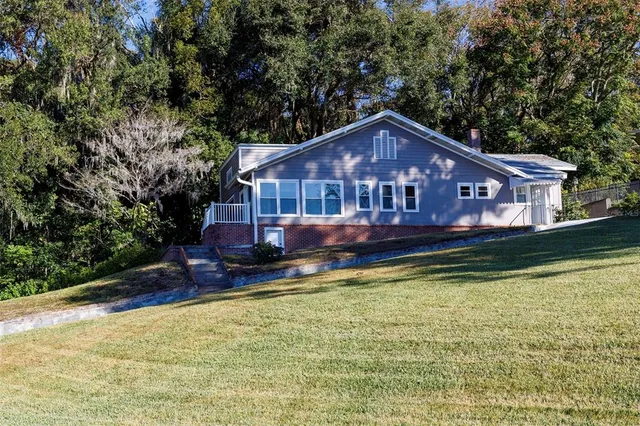 a view of a house with a swimming pool
