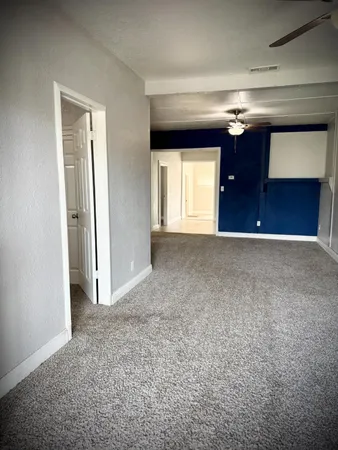 a view of wooden floor in an empty room
