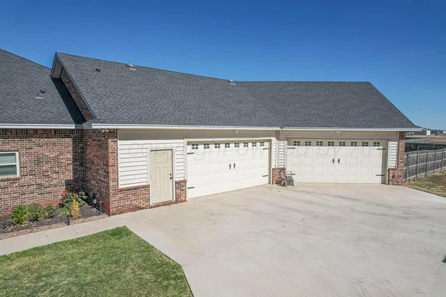 a view of a backyard of a house