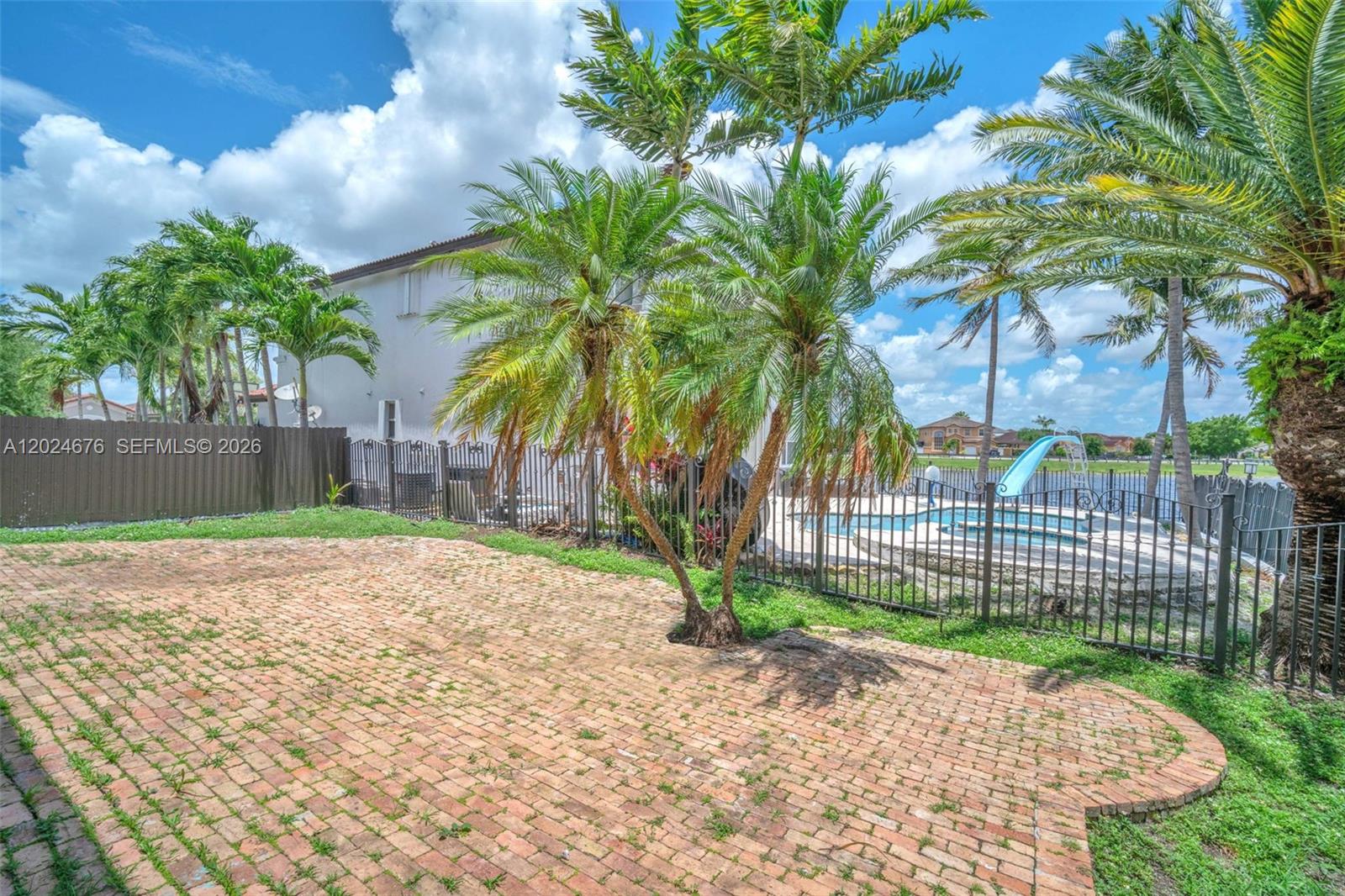 2155 Southwest 156th Court Miami, FL 33185 - Photo 55 of 57 a view of a backyard with a garden