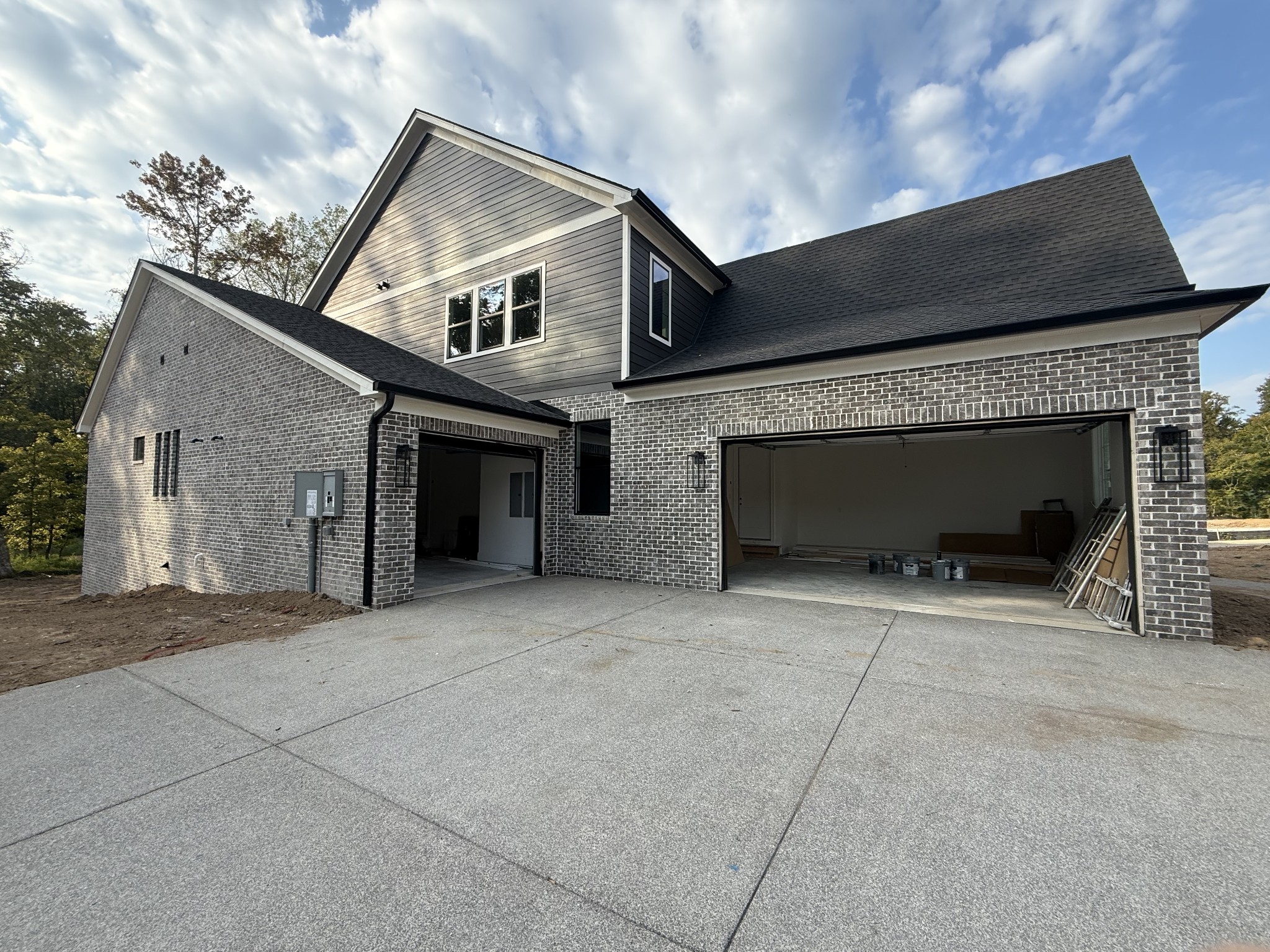 5801 Brees Place Arrington, TN 37014 - Photo 4 of 95 front view of a house with a garage