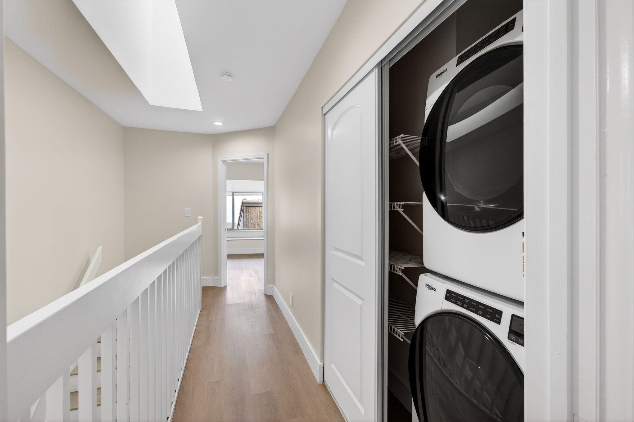 1330 Northwest 13th Street, Unit 12 Boca Raton, FL 33486 - Photo 31 of 52 a view of a hallway with washer and dryer