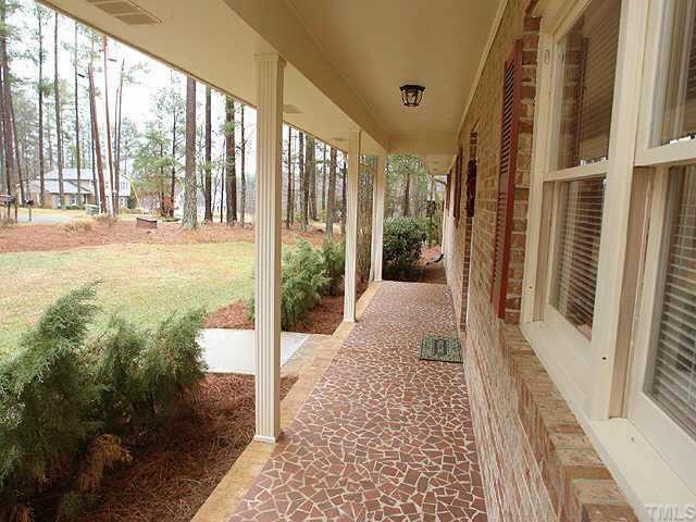 5015 Raintree Road Durham, NC 27712 - Photo 8 of 10 a view of a porch