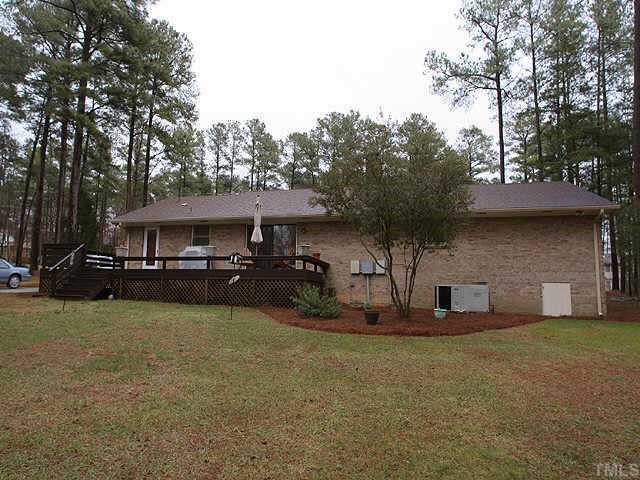5015 Raintree Road Durham, NC 27712 - Photo 10 of 10 a view of a house with backyard porch and sitting area