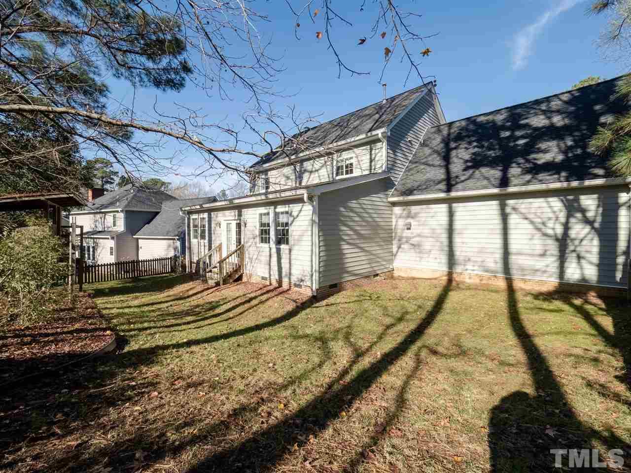 1003 Beringer Place Apex, NC 27502 - Photo 27 of 30 a view of a backyard