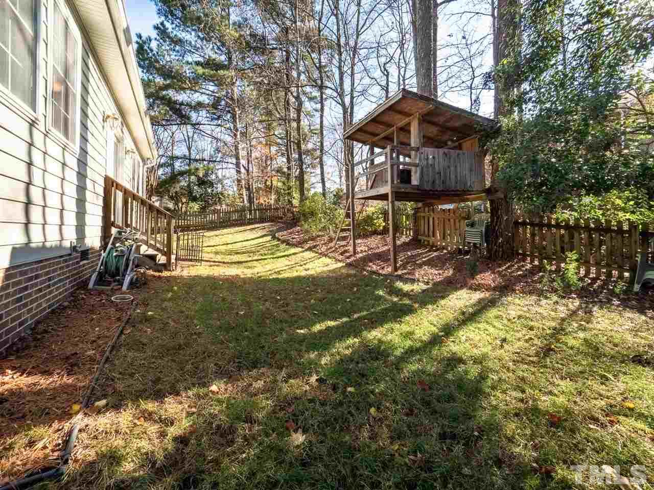 1003 Beringer Place Apex, NC 27502 - Photo 28 of 30 a view of a chairs in backyard of the house