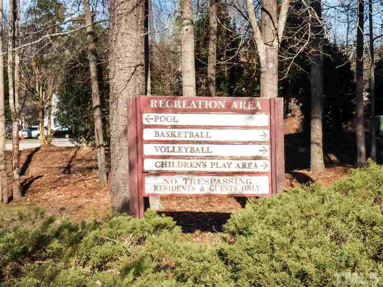 1003 Beringer Place Apex, NC 27502 - Photo 30 of 30 a sign on the side of a road