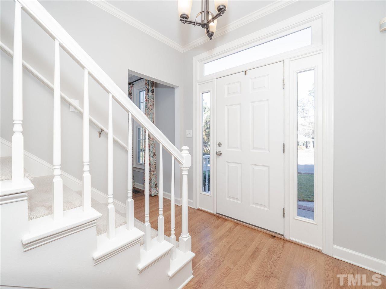 1003 Beringer Place Apex, NC 27502 - Photo 4 of 30 a view of entryway with wooden floor