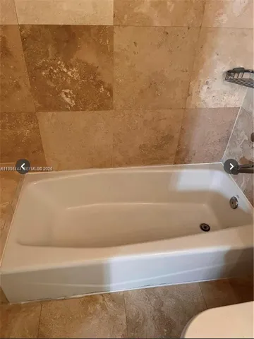 a view of yard with patio