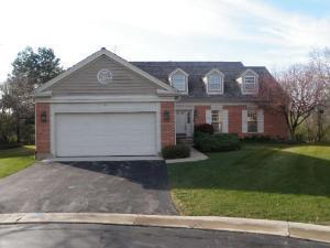 190 Glamis Lane Inverness, IL 60067 - Photo 1 of 1 a front view of a house with a yard and garage